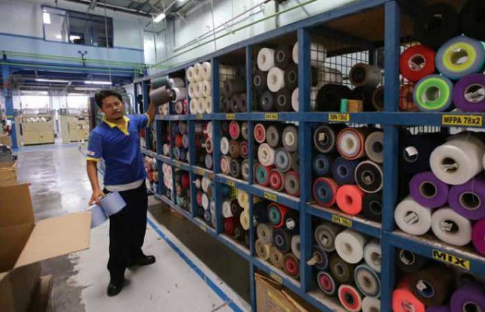 出口订单如潮涌至，纺织业提升产量