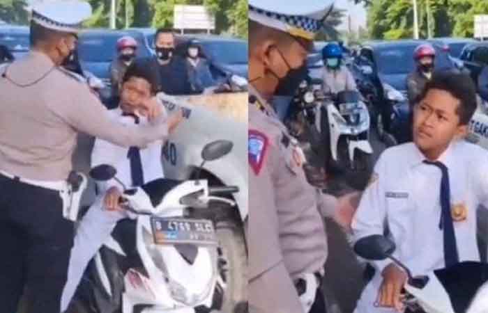 国中生骑摩托车不戴头盔被警察训斥还生气