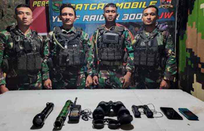 国军与巴布亚武装犯罪团伙交火 缴获对讲机、望远镜和手电筒等物证